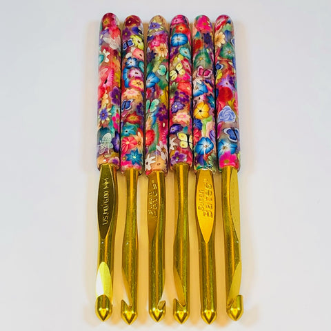 Polymer Clay Embellished Crochet Hook - Susan Bates - Size J/10 6.00mm - Multicolored Flowers and Butterflies - jennrossdesigns.com