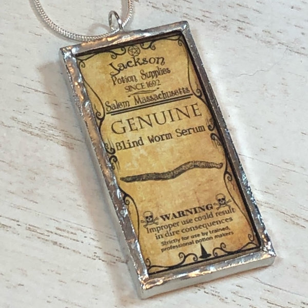 Handmade Double-Sided Glass and Silver Soldered Charm Pendant Necklace - 1"x 2" - Pewter Finish - Witches Wart and Blind Worm Serum