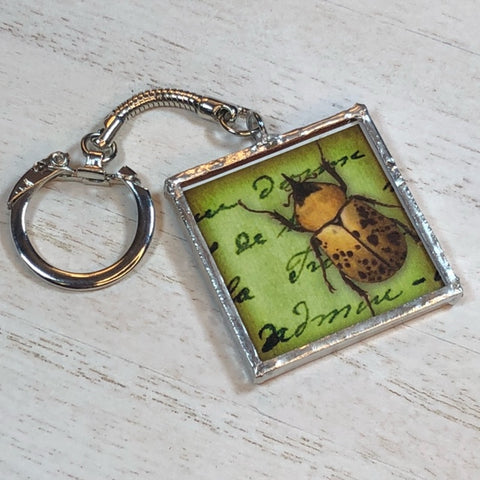 Handmade Glass and Silver Soldered Double-Sided Keychain - Lead Free Pewter Finish - Spotted Beetle and Striped Beetle