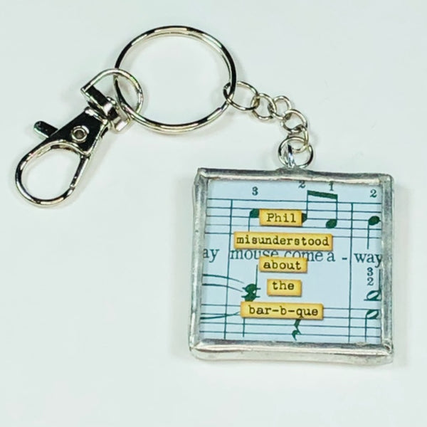 Handmade Glass and Silver Soldered Reversible Keychain - Lead Free Pewter Finish - Phil's Misunderstanding